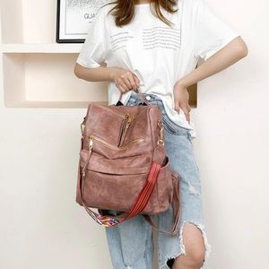 Dusty pink vegan leather zipper detail mini backpacks